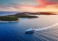 Aerial view on the luxury yacht during sunset. Adventure and travel.  Landscape with ship on Adriatic sea. Luxury cruise. Royalty Free Stock Photo