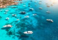 Aerial view of luxury yachts and boats on blue sea at sunset Royalty Free Stock Photo