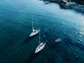 Aerial view of luxury yachts, sailing yachts, clear blue water. Travel. Cruise vacation. Yachting