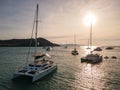 Aerial view of Luxury yachts sailing in tropical sea at sunset Royalty Free Stock Photo