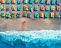 Aerial view of lying woman with swim ring in the sea Royalty Free Stock Photo