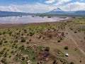 Aerial view of Maasai boma or family rural village on the coast of Salty lake Natron in the Great Rift Valley, Tanzania