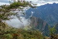 Aerial view of Machu Picchu Inca citadel in the clouds, located on a mountain ridge above the Sacred Valley Royalty Free Stock Photo
