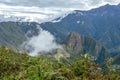 Aerial view of Machu Picchu Inca citadel in the clouds, located on a mountain ridge above the Sacred Valley Royalty Free Stock Photo