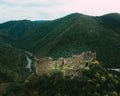 Aerial view of Maglic Castle and green mountains in Serbia