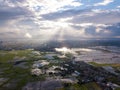 Aerial view magnificent sun ray over paddy field