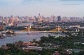 Aerial view of Maha Chesadabodindranusorn Bridge or Nonthaburi Bridge crossing Chao Phraya River and Bangkok skyline, Thailand. Royalty Free Stock Photo