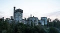 Aerial view of majestic Lismore Castle in County Waterford, Ireland, bathed in the golden glow of the setting sun Royalty Free Stock Photo