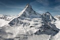 Aerial view of majestic Matterhorn mountain in front of a blue sky