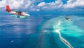 Aerial view of a seaplane approaching island in the Maldives Royalty Free Stock Photo