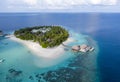 Aerial view of the Maldivian island with bungalows in the Indian Ocean Royalty Free Stock Photo