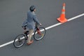 Aerial view of a Man cycling on city road