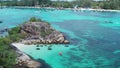 Aerial view of man kayaking in crystal clear sea water near Koh Kra island in Thailand