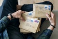 Aerial view of a man sorting an envelope