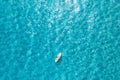 Aerial view of with man on sup board in blue sea at summer day Royalty Free Stock Photo