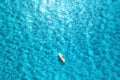 Aerial view of with man on sup board in blue sea at summer day Royalty Free Stock Photo