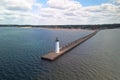 Manistee light house at lake Michigan shore line