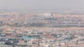 Aerial view of many apartment houses in Dubai city from above timelapse