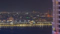 Aerial view of many luxury villas and hotels on the Palm Jumeirah island in Dubai night timelapse. UAE Royalty Free Stock Photo