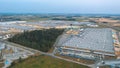 Aerial view of many modern industrial warehouses. Logistics center of the online store