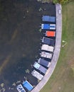 Aerial view of many recreational boats at Kent lake curved marina in Kensington metro park Michigan