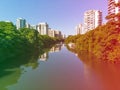 Aerial view of Marapendi canal in Barra da Tijuca on a summer day. Tall residential skyscrapers on both sides, with Royalty Free Stock Photo