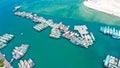 Aerial view of the marina docks with boats moored there