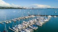 Aerial view on a marina and resting boats with Auckland city center on the background. New Zealand.