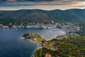 Aerial view of marina Vis at sunset, Croatia, a lot of chaotically standing boats in a bay, roofs of orange color Royalty Free Stock Photo