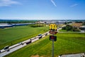 Aerial View of McDonalds McCafe Sign Overlooking Highway Royalty Free Stock Photo