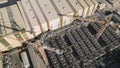 Aerial view of the mechanical facilities of the mineral processing plant under construction with tower cranes Royalty Free Stock Photo