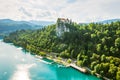 Aerial view of mediaeval Bled castle on the cliff of the mountain under lake Bled with turquoise blue water in Slovenia Royalty Free Stock Photo