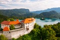 Aerial view of mediaeval Bled castle on the cliff of the mountain under lake Bled with turquoise blue water in Slovenia Royalty Free Stock Photo