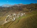 Aerial view of medieval ancient stone battle tower complex in the mountains of Ingushetia, Russia Royalty Free Stock Photo