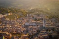 Aerial view of medieval city of Assisi fading into fog in Umbria, Italy Royalty Free Stock Photo