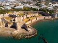 Aerial view of Mamure Castle on Mediterranean coast against backdrop of Bozdogan village