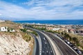 Aerial view on the Mediterranean highway along Benalmadena town. Costa del Sol, Andalusia, Southern Spain