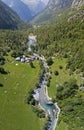 Aerial view of the Mello Valley, Val di Mello, a green valley surrounded by granite mountains and forest trees. Val Masino. Italy Royalty Free Stock Photo