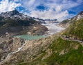 Aerial view of the melting Rhone glacier and the glacial lake in the Swiss Alps Royalty Free Stock Photo