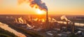 Aerial view of metallurgical plant at dawn with smoke and smog emissions impacting local ecology Royalty Free Stock Photo