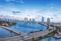 Aerial view of Miami skyscrapers with blue cloudy sky