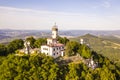 Aerial view of Milesovka mountain with lookout tower. Royalty Free Stock Photo