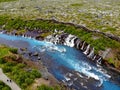 The aerial view of the milky blue river near Barnafoss Falls, Iceland