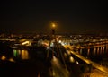 Aerial view of the Millennium Bridge over Southport Marine Lake at night with moon rise