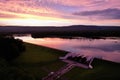 Aerial view of Minsi Lake in Pennsylvania, USA, with a stunning purple sky in the background