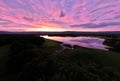 Aerial view of Minsi Lake in Pennsylvania, USA, with a stunning purple sky in the background