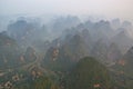 Aerial view of misty karst mountains in GuangXi Royalty Free Stock Photo