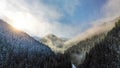 Aerial view of misty winter forest and scenic sunset in Low Tatras mountains of Slovakia Royalty Free Stock Photo