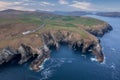 Aerial view with Mizen Head Lighthouse with spectaculars cliffs in West Cork Ireland Royalty Free Stock Photo