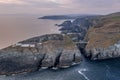 Aerial view with Mizen Head Lighthouse with spectaculars cliffs in West Cork Ireland Royalty Free Stock Photo